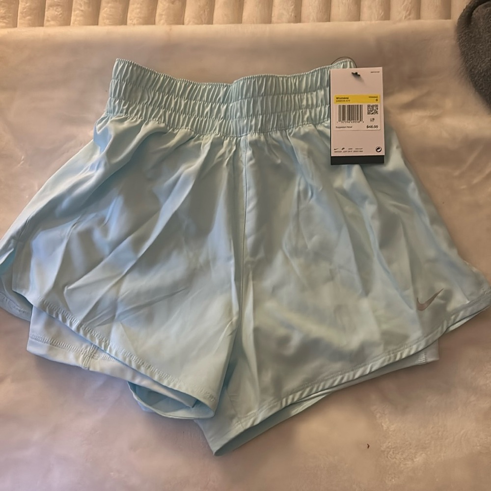 Nike Dri-fit, loose fit moves sweat away.